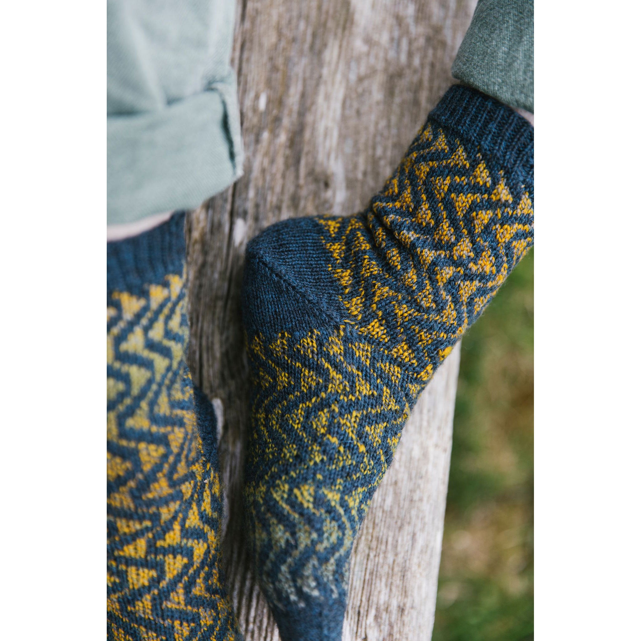 Close-up of patterned socks with a natural background