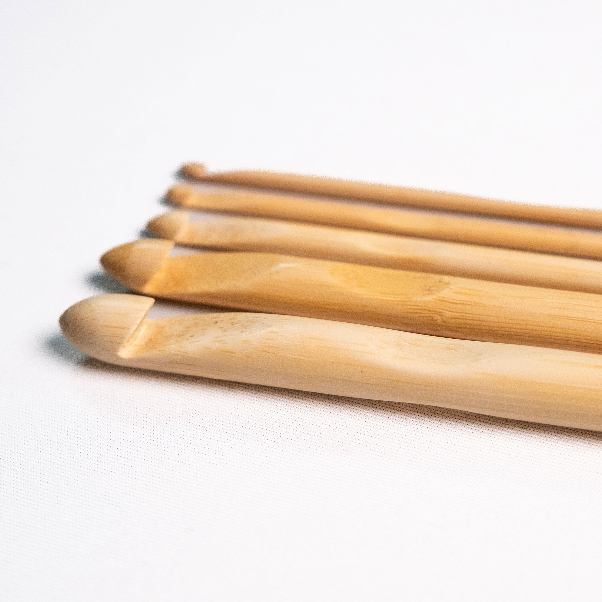 Group of five ChiaoGoo bamboo inline hooks