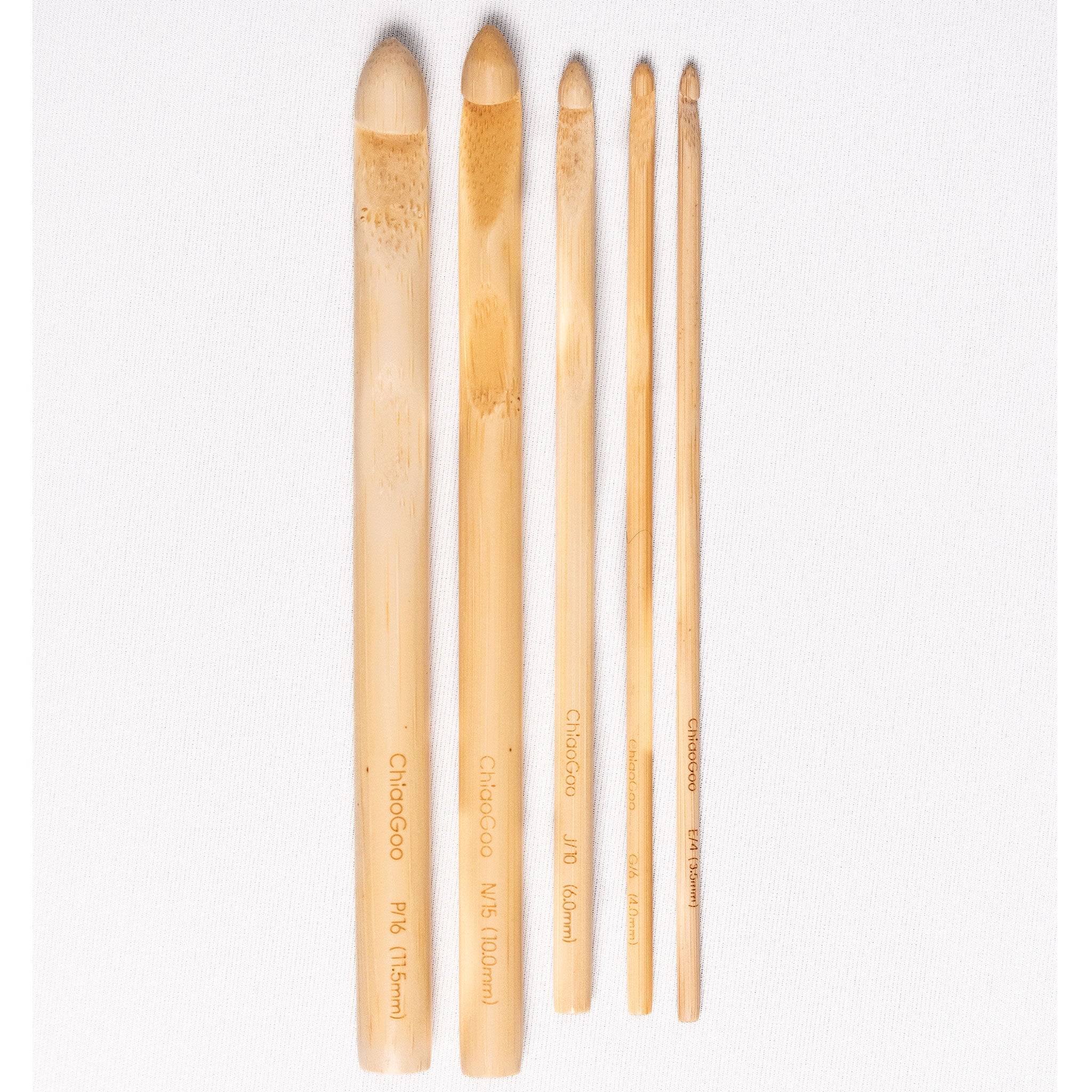 Set of five bamboo crochet hooks , left to right, 11.5mm, 10mm, 6mm, 4mm and 5.5mm