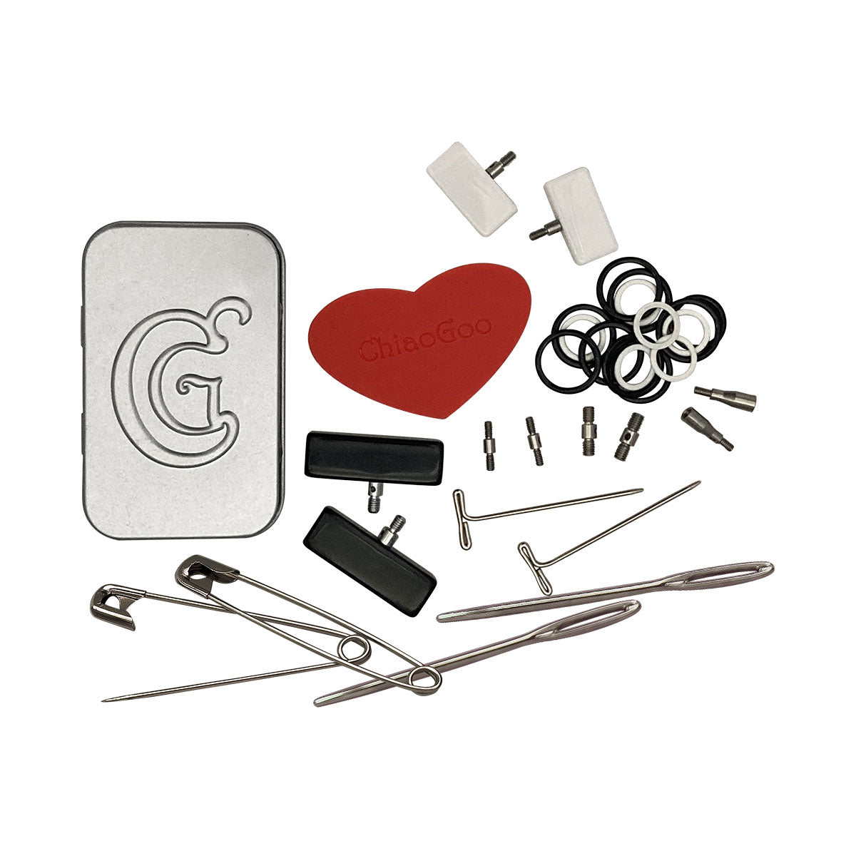 Metal case measuring 6 x 4cm and 
2 x large cable connectors, 2 x small cable connectors, 2 x small end stoppers, 2 x large end stoppers, 2 x tightening keys, 2 x darning needles, 2 x safety pins, 2 x Large Tip to Small Cable adapters, 20 x stitch markers, 1 x heart-shaped rubber gripper