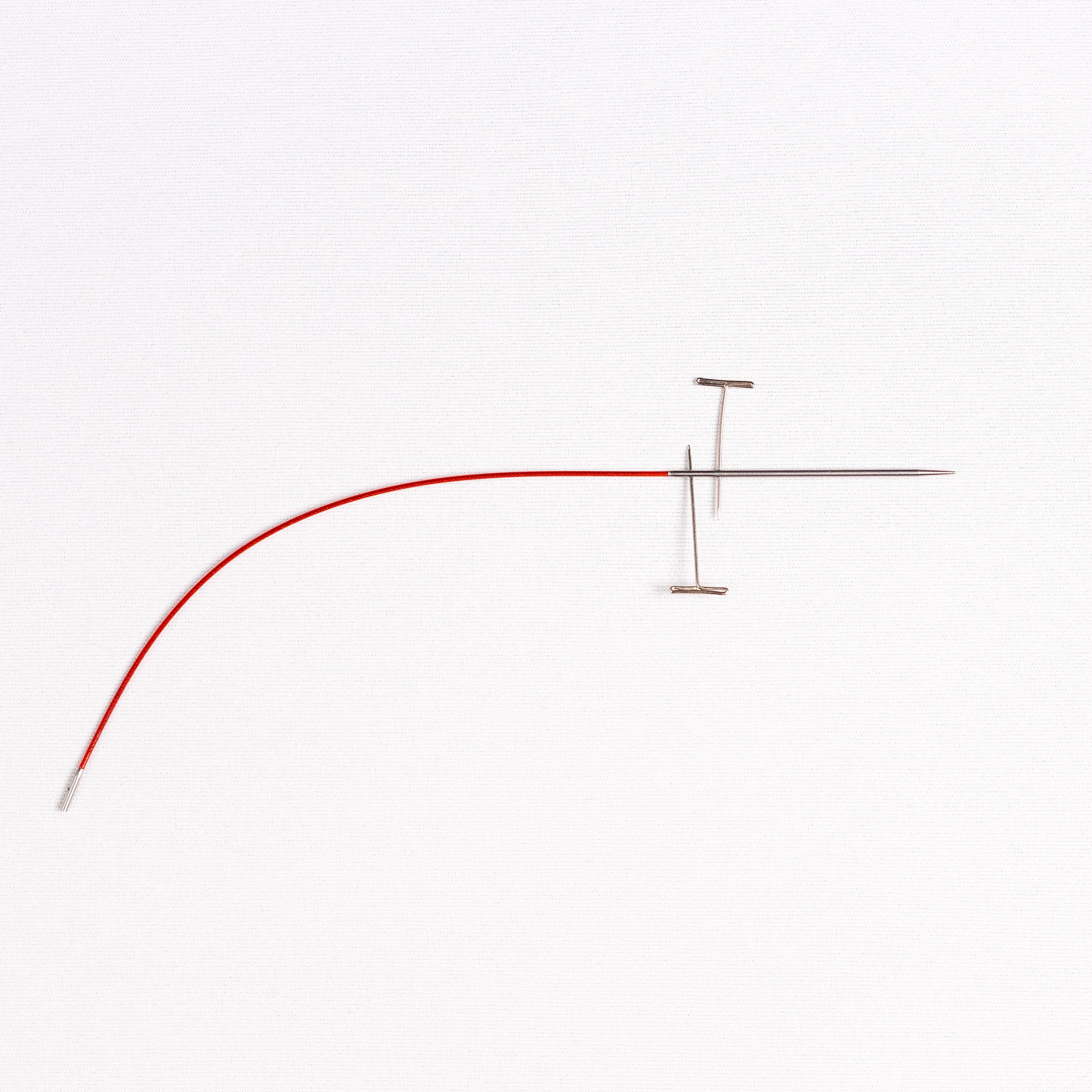 Stainless steel T-pin tightening key in interchangeable cable and in tightening hole at base of mini tip