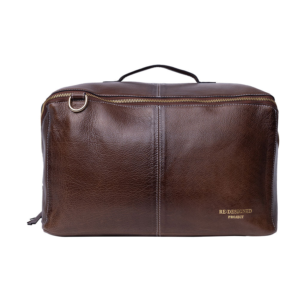 Face view of woodsmoke brown XL leather organiser project bag with RE: DESIGNED PROJECT branding on a white background