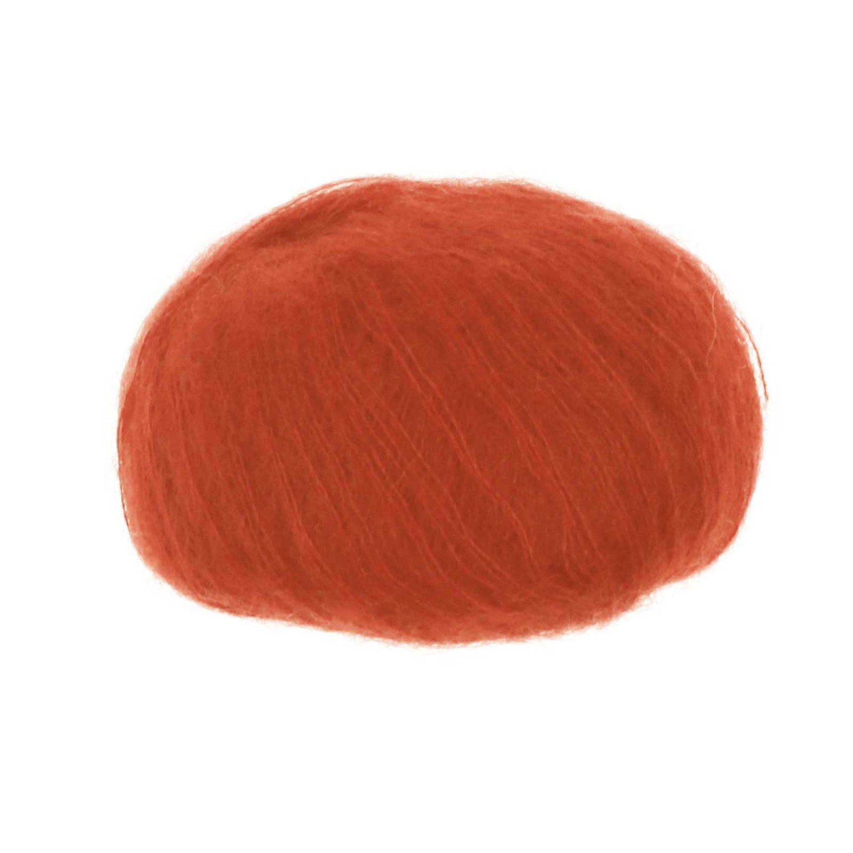 A ball of yarn in russet shade showing mohair halo