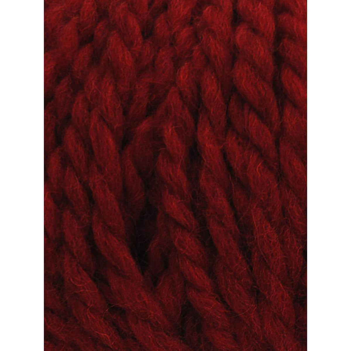 Close-up of deep red textured yarn on a white background
