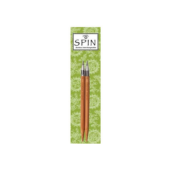 Pair of ChiaoGoo SPIN Bamboo interchangeable knitting tips on green branded packaging on a white background