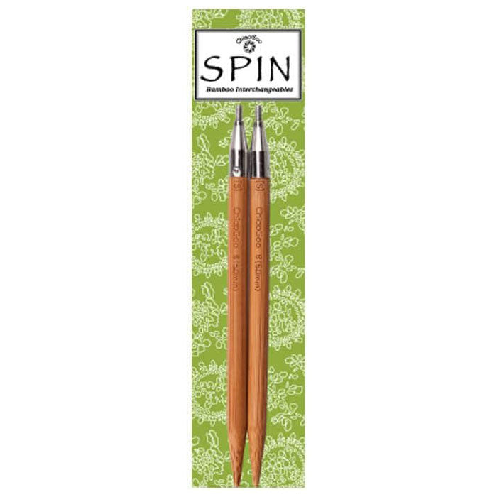 Pair of ChiaoGoo SPIN Bamboo interchangeable knitting tips on green branded packaging on a white background