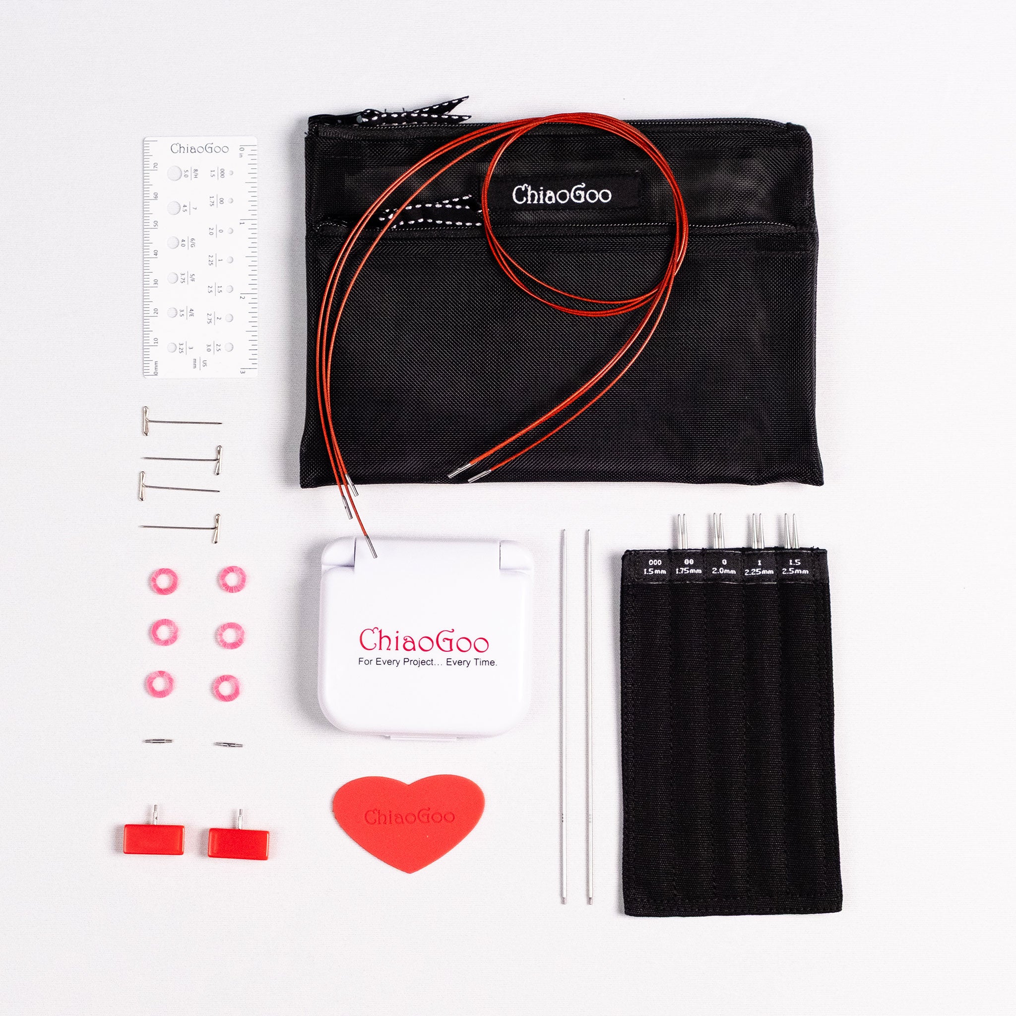 ChiaoGoo 5in Mini set showing labelled tip sleeve, three red lace cables curled together in a circle, a white plastic ruler needle gauge and Mini Tools Kit - white plastic click shut container with accessories displayed