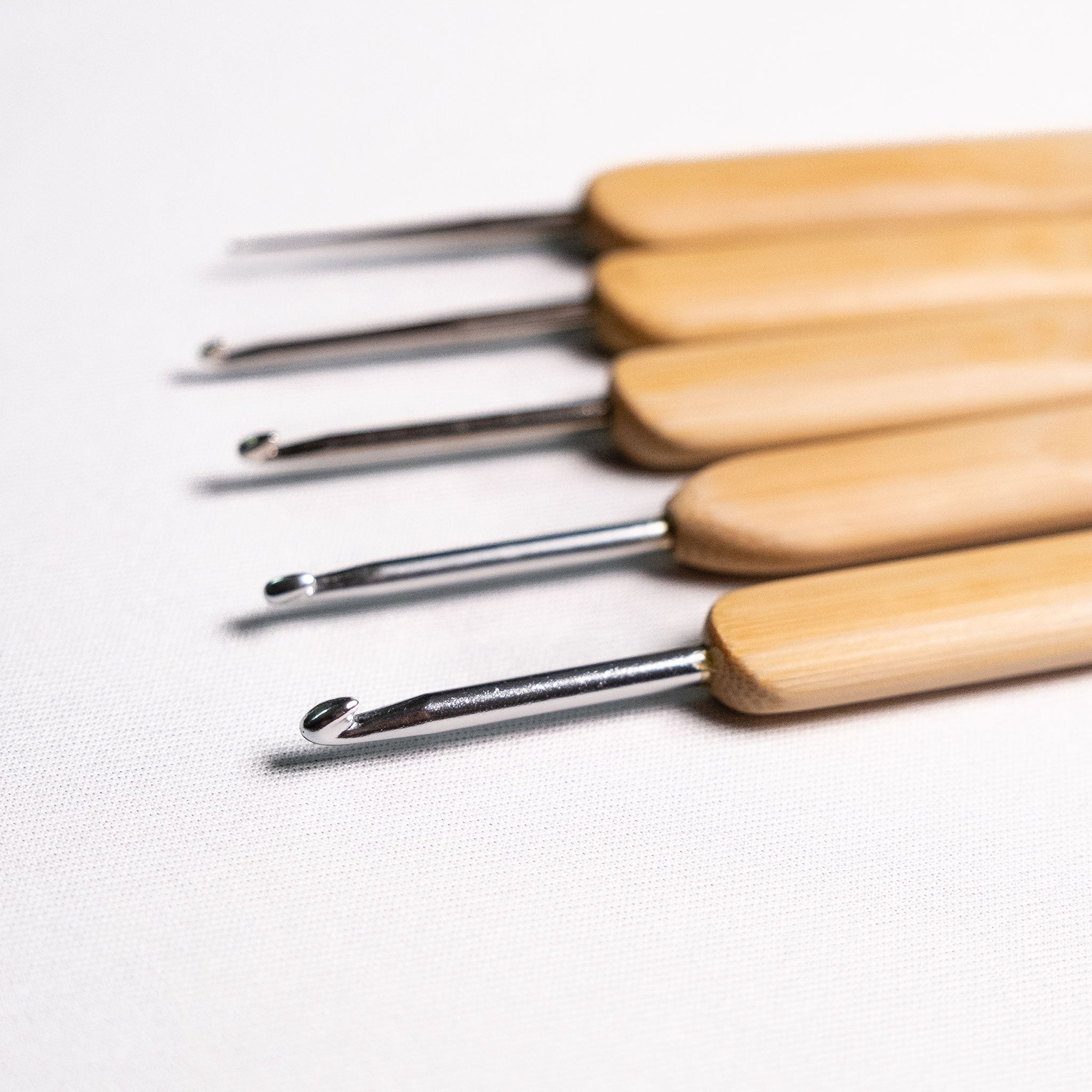 Close up of metal crochet hooks