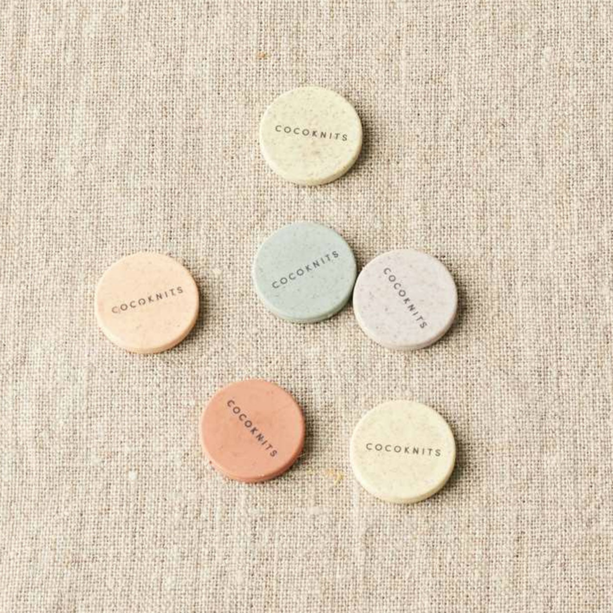 Set of six round magnets with Cocoknits logo on them
