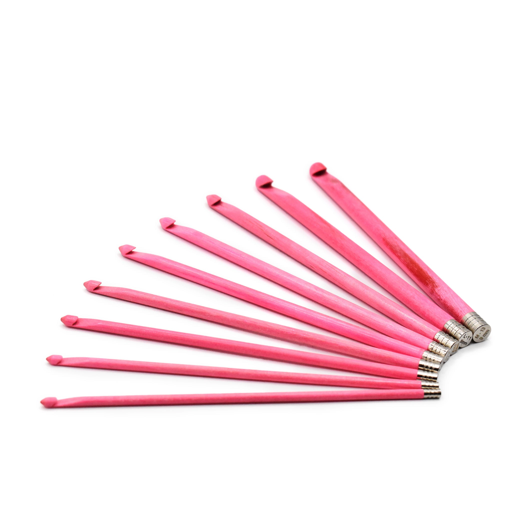 Set of LYKKE blush pink crochet hooks on a white background