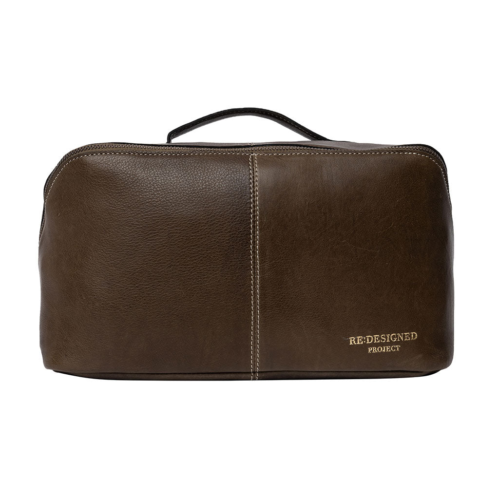 Dark green leather knitting project with 'RE:DESIGNED PROJECT' branding, on a white background