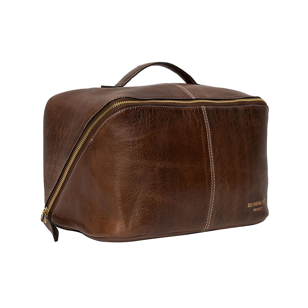 Woodsmoke dark brown leather knitting project bag with gold coloured zipper and RE:DESIGNED logo, on a white background