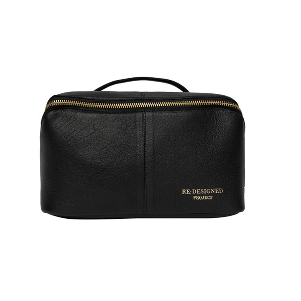 Black leather knitting project bag with gold zipper on a white background