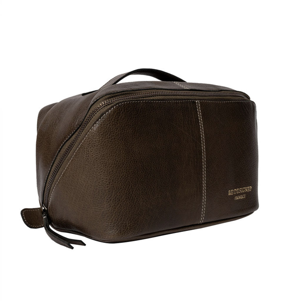 Dark green leather knitting project bag, zipped closed, contrast stitching detail with gold 'RE:DESIGNED' logo 