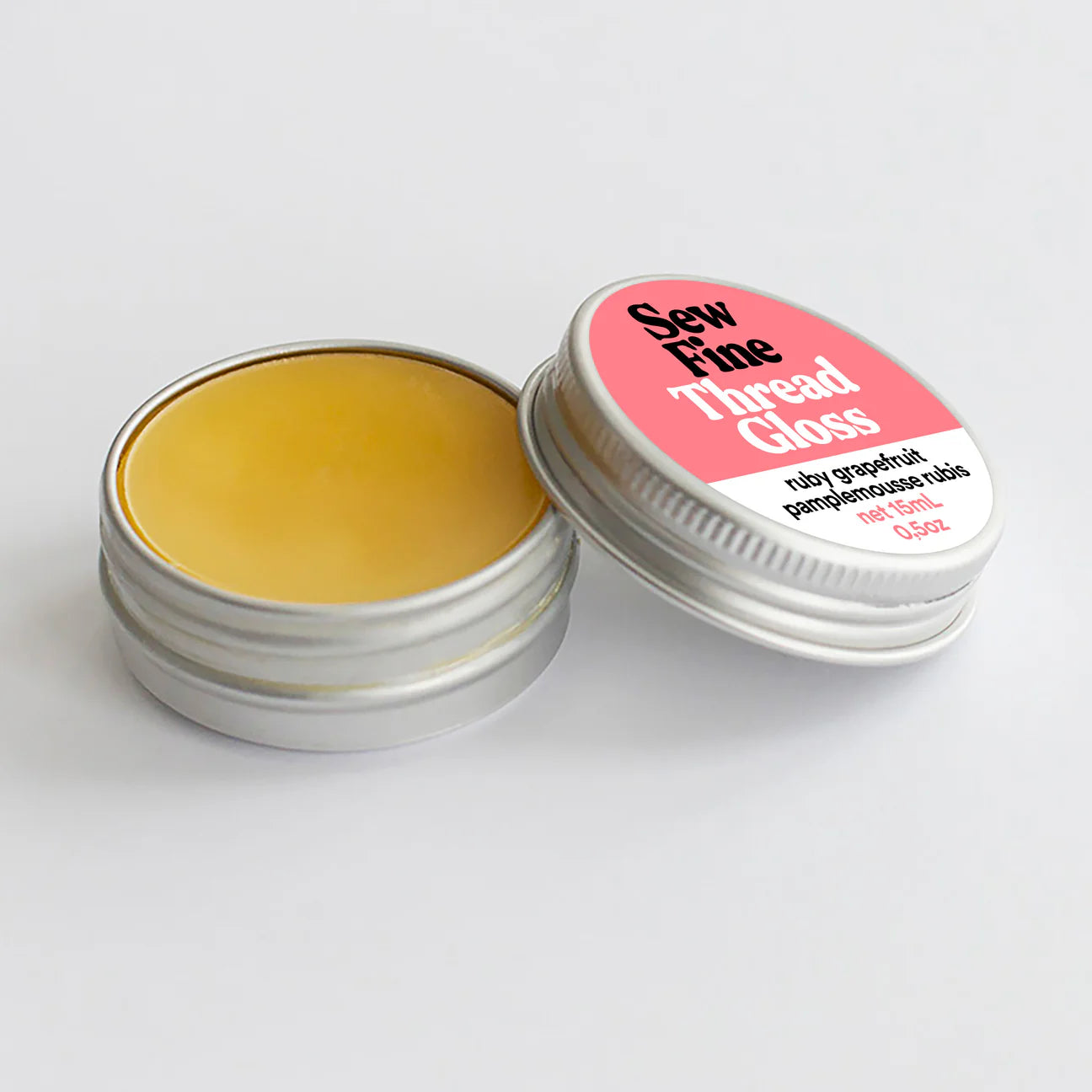 Open tin of Sew Fine Thread Gloss