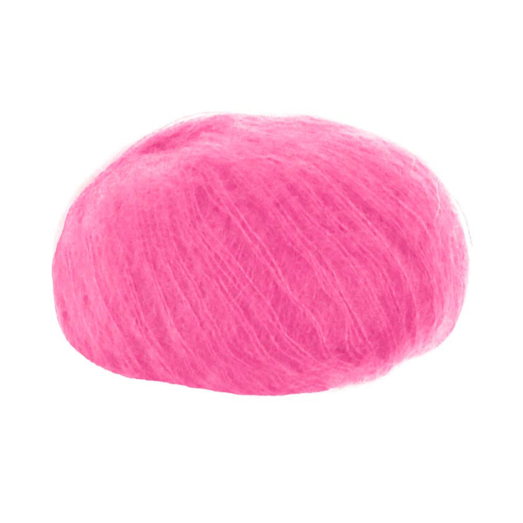 A ball of Lana Gatto Silk Mohiar in a bright pink shade 