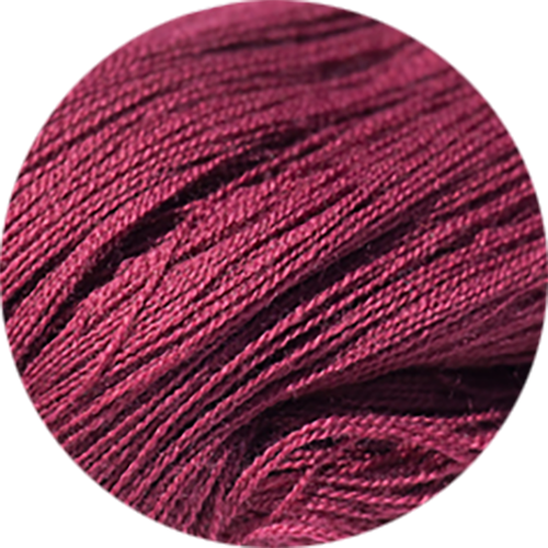 Close-up of burgundy yarn on a white background